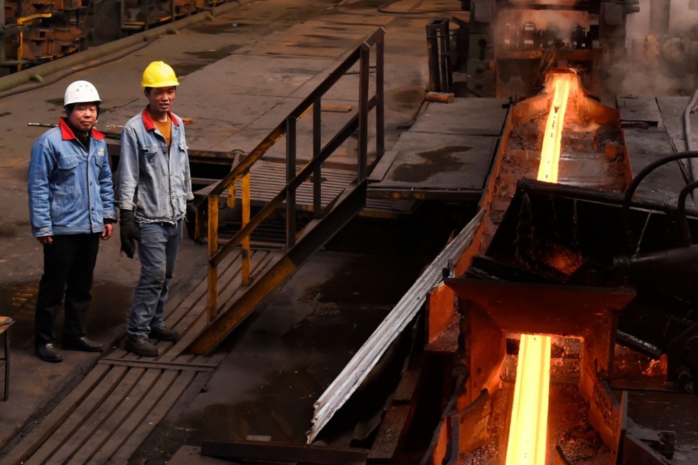 A file picture of workers at a steel plant in China's Shandong province. Photo: Agence France-Presse
