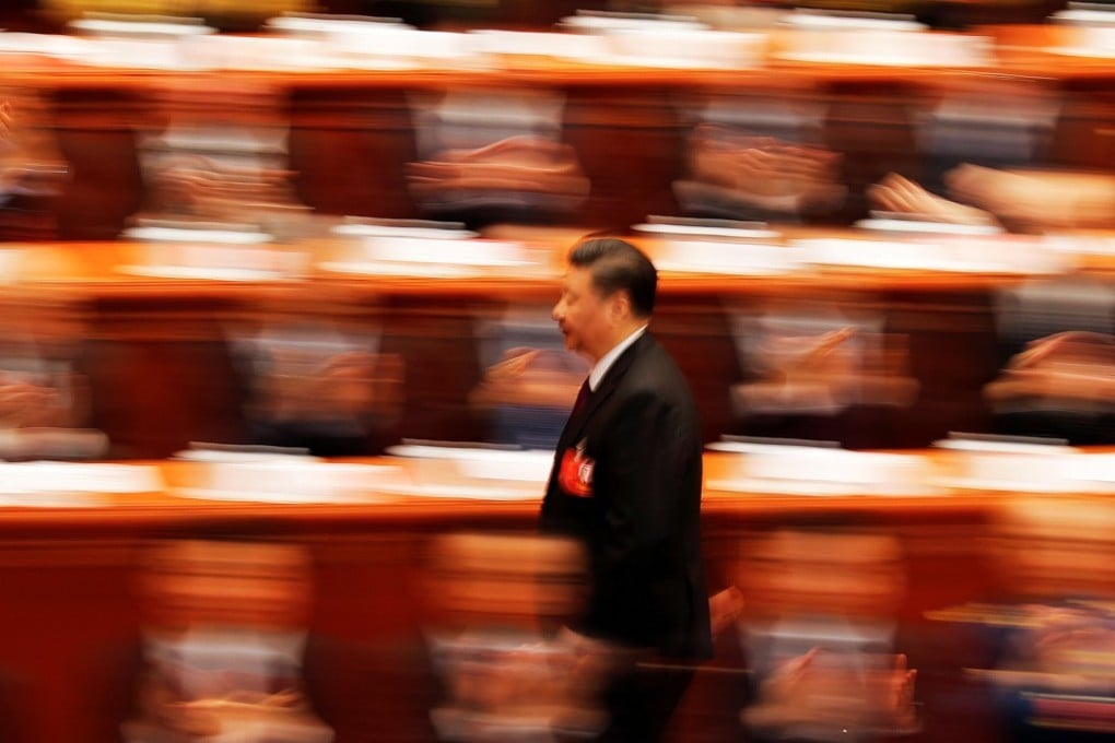 President Xi Jinping walks to deliver his speech at the closing session of the National People’s Congress at the Great Hall of the People in Beijing, on March 20. Photo: Reuters