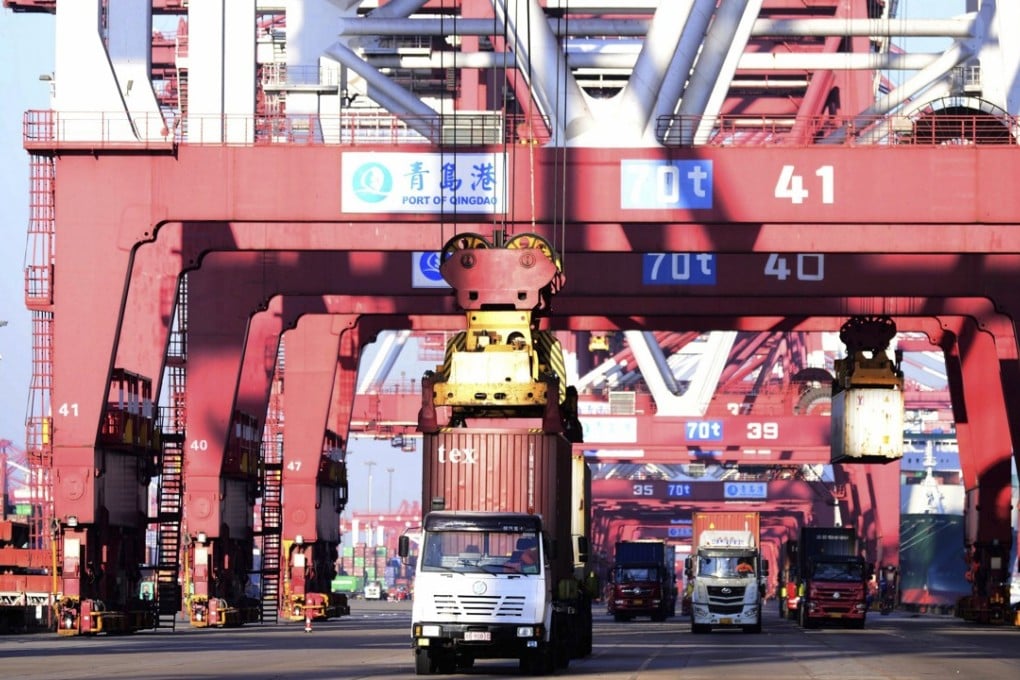Lorries picking up shipping containers at a Chinese port. Road transport makes up 60 per cent of China’s 11 trillion yuan logistics market. Photo: AP