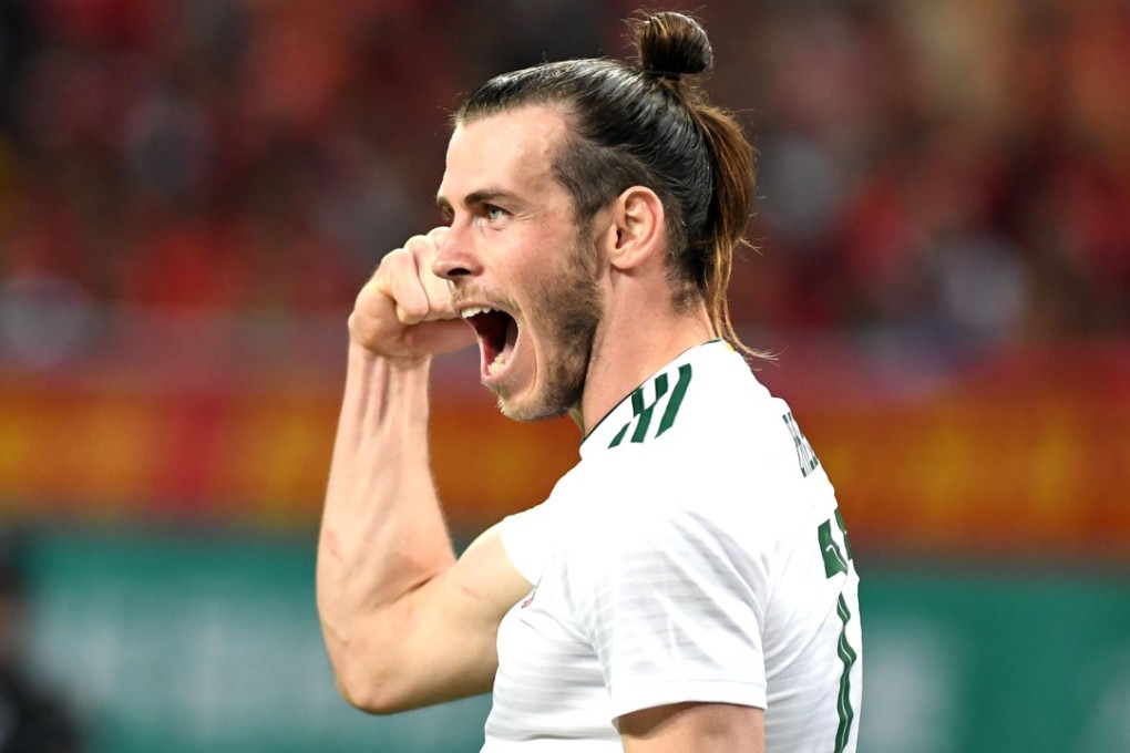 Gareth Bale was too strong for China as he and his Wales teammates ran rampage in Nanning. Photo: Xinhua