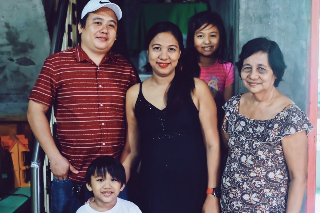 Joy Fernandez and her family. Photo: Chao Wee Lee