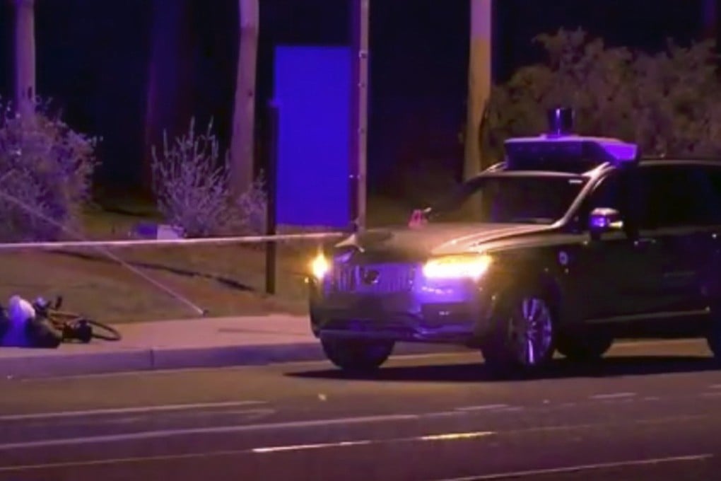 This March 19, 2018 still image taken from video provided by ABC-15 in Arizona shows investigators at the scene of a fatal accident involving a self driving Uber car on the street in Tempe. Police in the city of Tempe said on March 19, 2018, that the vehicle was in autonomous mode with an operator behind the wheel when the woman walking outside a pedestrian crossing was hit. The incident prompted Toyota to suspends its own driverless car programme. Photo: ABC-15.com via AP