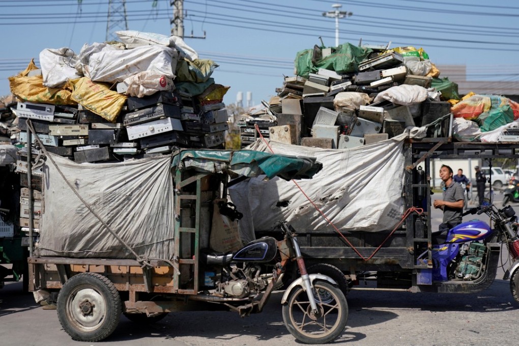 Tricycles carrying electronic waste are seen at the government-sponsored recycling park in the township of Guiyu, Guangdong Province, China, in January. Photo: Reuters