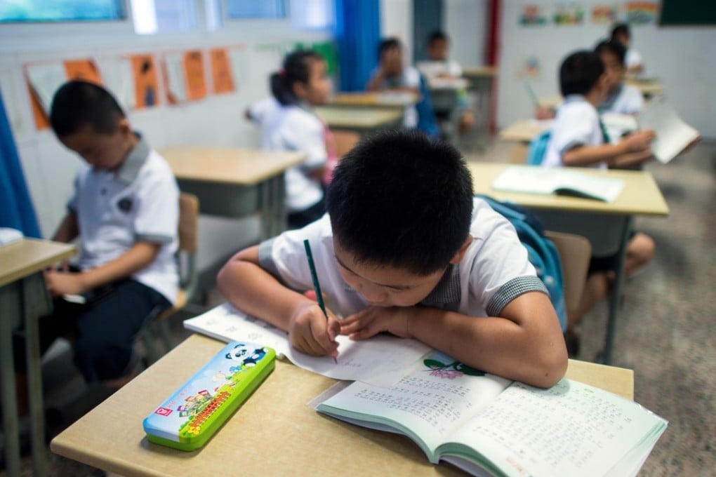 China’s education authorities recently instructed primary and middle schools across the country to reduce the homework pressure on pupils. Photo: AFP