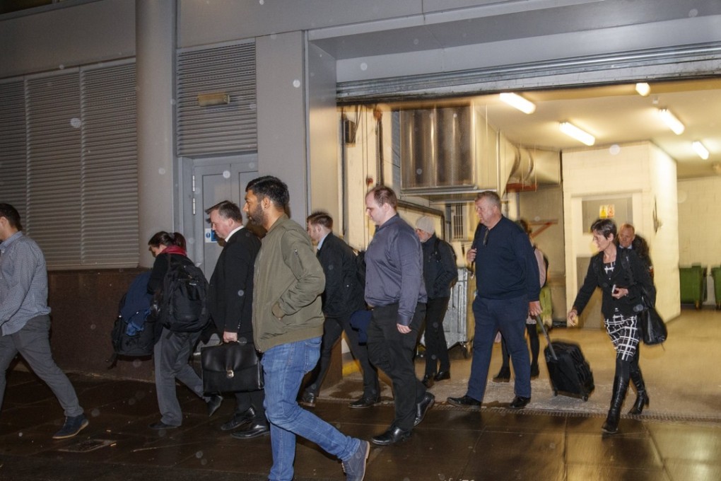 Information Commissioner's Office (ICO) enforcement officers leave on March 24, 2018 after searching the Cambridge Analytica headquarters in London. The company is accused of using the personal data of 50 million Facebook members for its own campaigns during the US election and the Brexit referendum. Photo: EPA-EFE