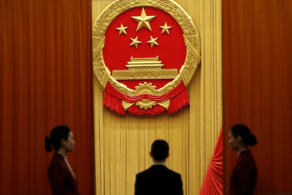 Attendants at the annual meeting of the National People's Congress in Beijing. Photo: AP
