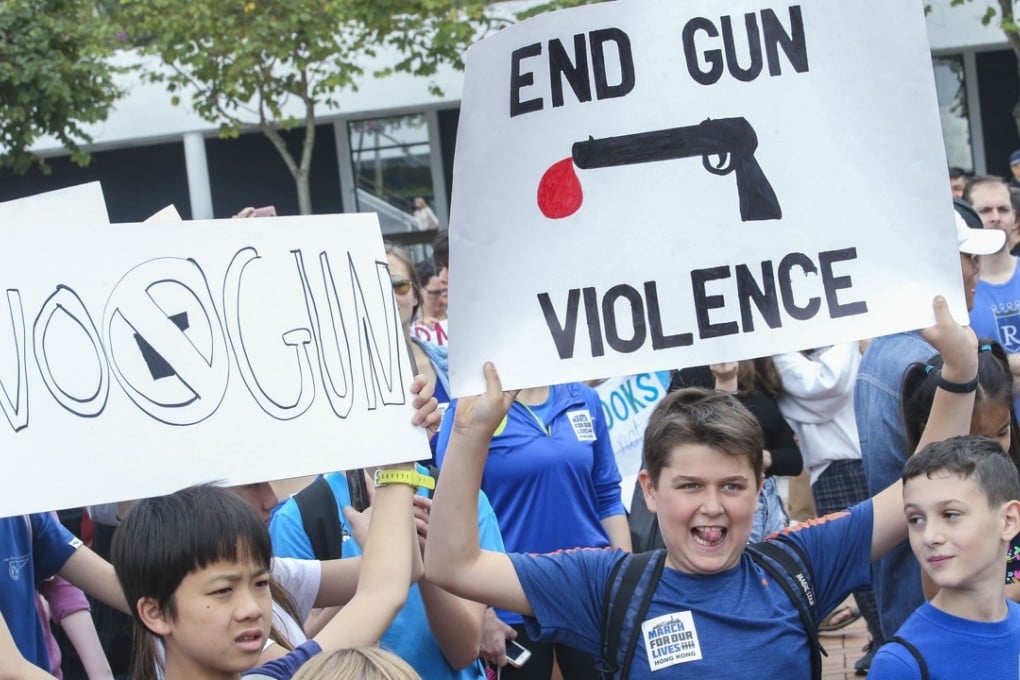 Pupils and their families gather in Central for a ‘sibling march’ as part of the March for Our Lives movement. Photo: David Wong