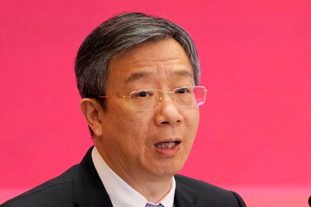 Central bank governor Yi Gang addresses the China Development Forum in Beijing on Sunday. Photo: Reuters