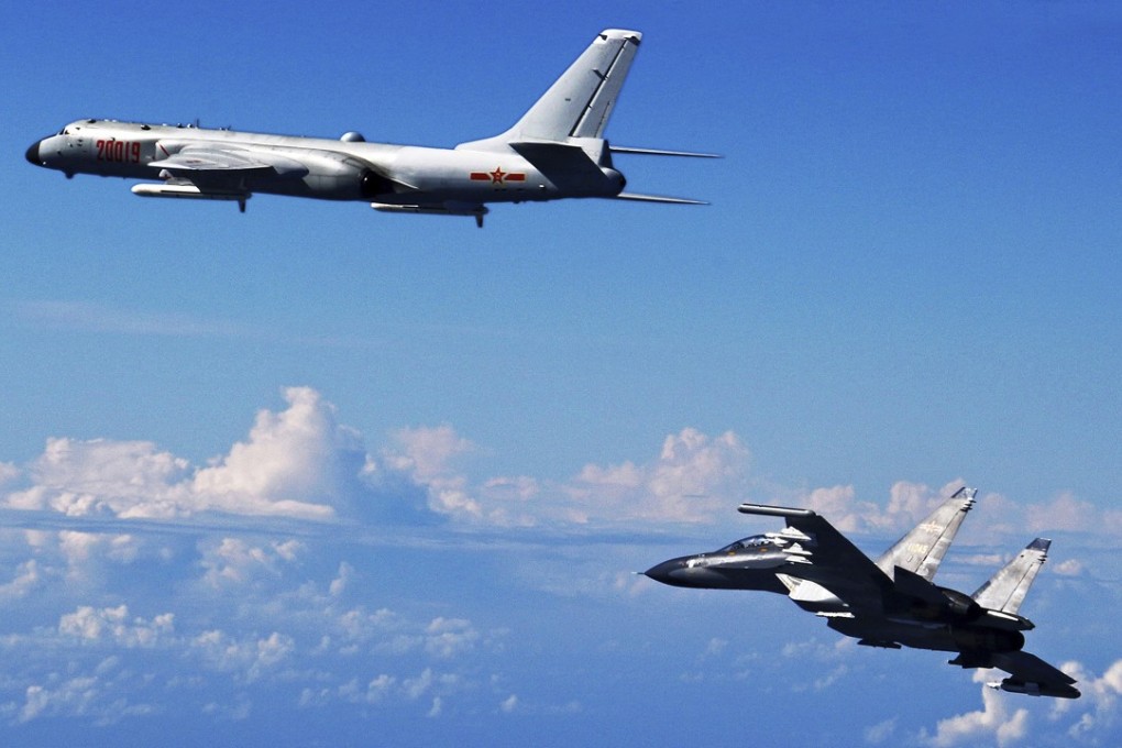 An Su-30 fighter and an H-6K bomber from the Chinese mainland’s air force take part in a drill in this file photograph. Taiwan on Monday scrambled aircraft to shadow military planes from the mainland as they flew through the Bashi Channel to the south of the island. Photo: Xinhua