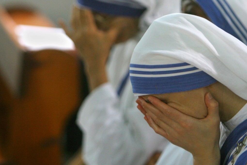 Nuns pray in the Deir Al Lateen Catholic church in Gaza City. Photo: AP