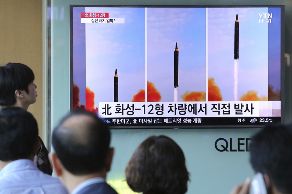 People in Seoul watch a TV screen showing a local news programme reporting on North Korea’s missile launch in September. A former Japanese foreign minister said China still has a key role to play in reining in Pyongyang’s nuclear ambitions. Photo: AP
