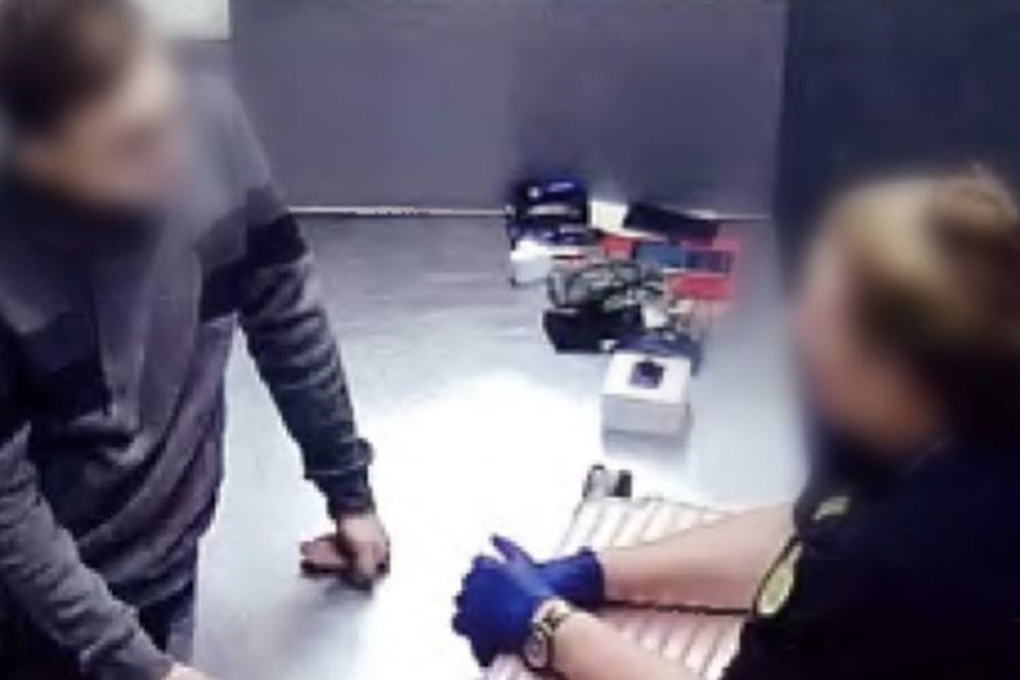 Australian Border Force officers arrested a Malaysian man who tried to enter the country with child porn material. Photo: Facebook/Australian Border Force