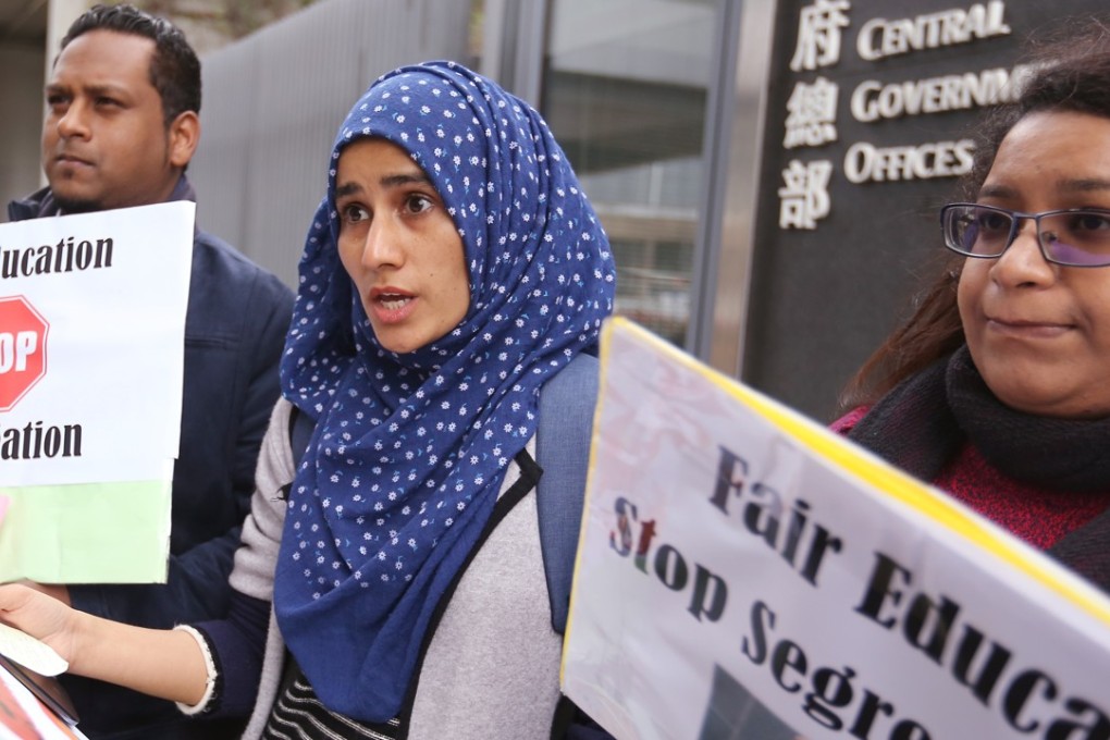 Ethnic minority residents call for a fairer educational policy, a few days ahead of the policy address by then Hong Kong chief executive Leung Chun-ying, outside the Chief Executive’s Office in Admiralty in January last year. Photo: Xiaomei Chen