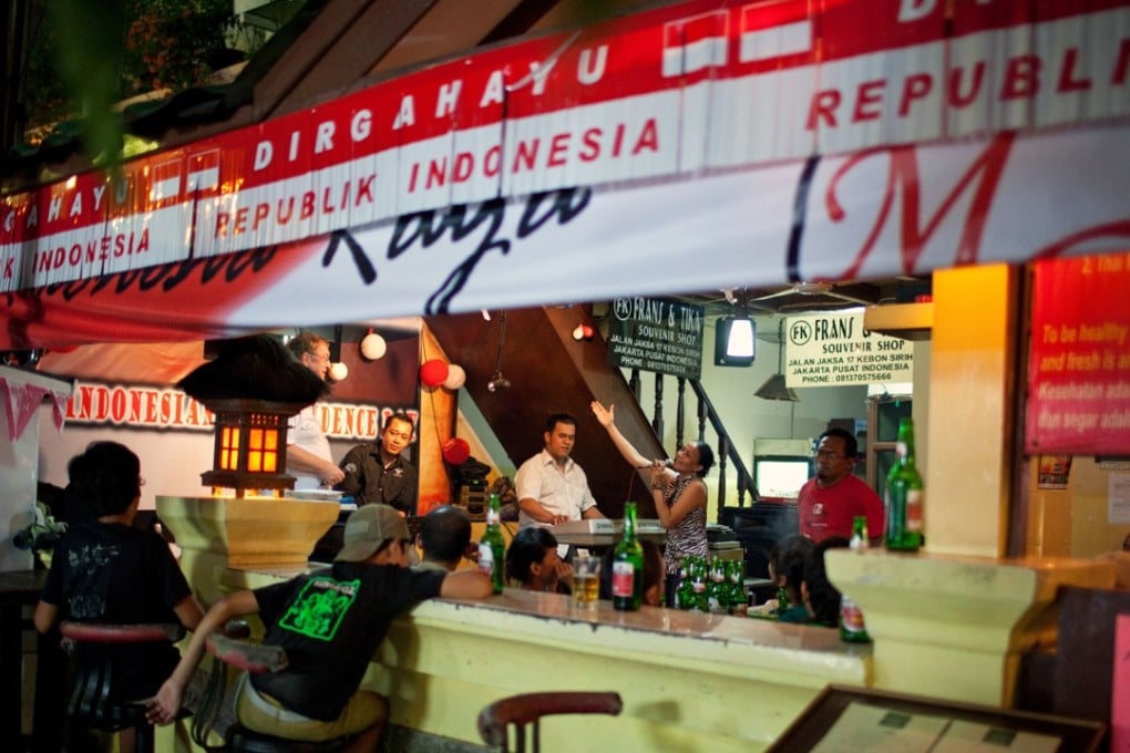 A night party in a bar on Jalan Jaksa in Jakarta, Indonesia. Photo: Alamy