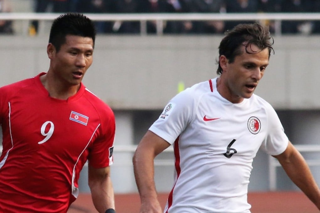 Hong Kong’s Roberto Affonso Jnr (right) outpaces his North Korea opponent. Photos: HKFA
