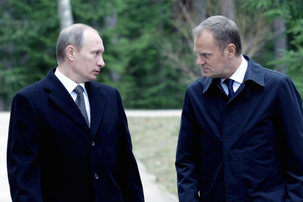In this file photo taken on April 07, 2010, Russia's then-Prime Minister Vladimir Putin speaks with Poland's then-Prime Minister Donald Tusk. Tusk, now the EU preisdent announced on Wednesday that 14 EU countries have expelled Russian diplomats. Several non-EU countries have done likewise. Photo: Ria Novosti via AFP