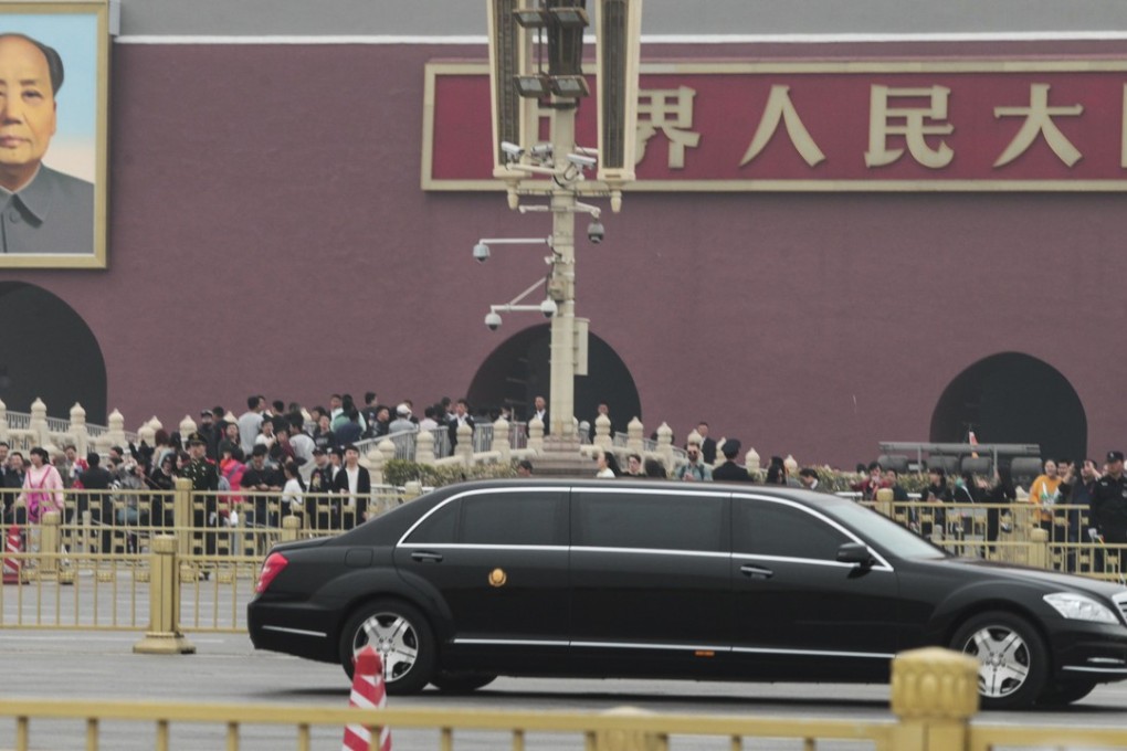 The motorcade and the car believed to be carrying the North Korea leader passes Tiananmen Square on Tuesday afternoon, Photo: Simon Song