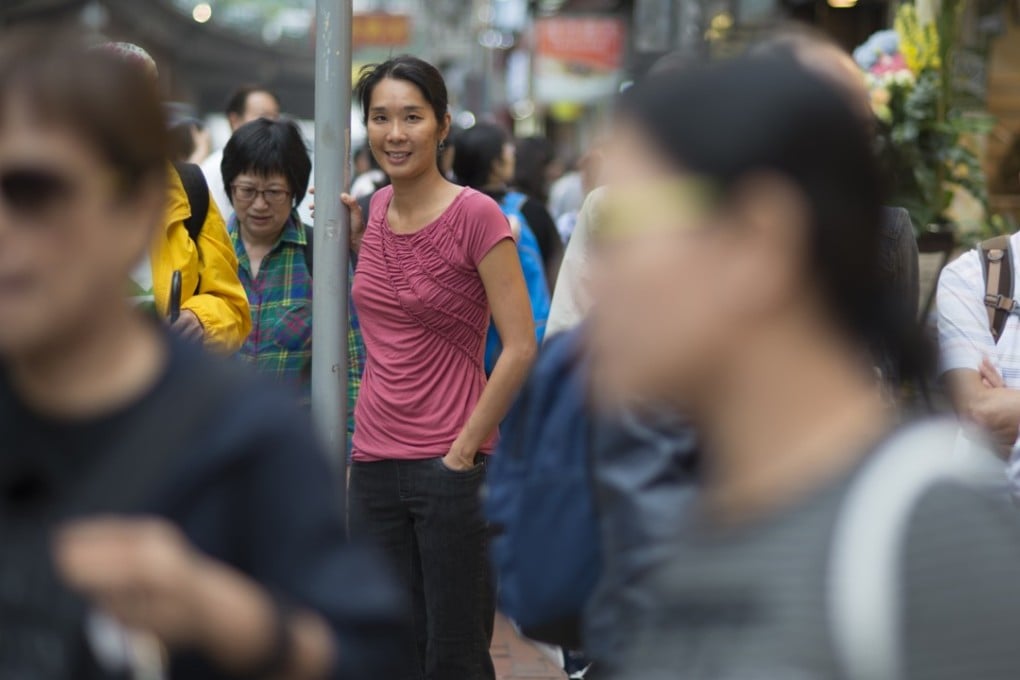 Hong Kong-born, Canada-educated dental surgeon Sheena Li in Causeway Bay. Picture: Antony Dickson