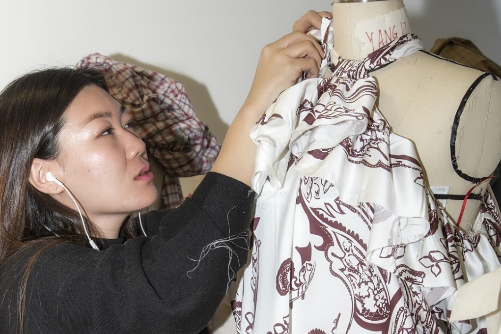 A student works on an outfit at IFA Paris in Shanghai, China. Photo: Fabrice Malard