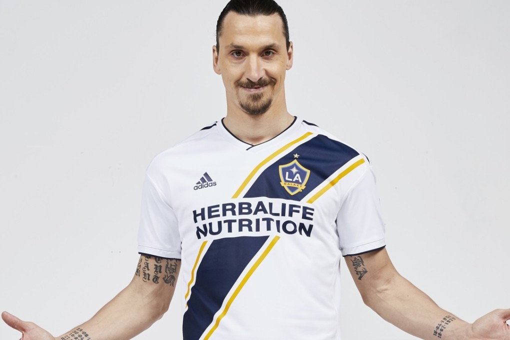 LA Galaxy forward Zlatan Ibrahimovic poses in his new club’s shirt. Photo: AP