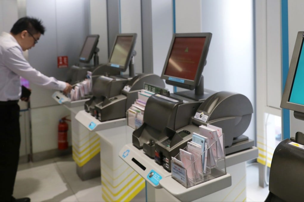A man at the Wan Chai Jockey Club off-course betting centre, as a mysterious glitch caused all betting to be suspended. Photo: Sam Tsang