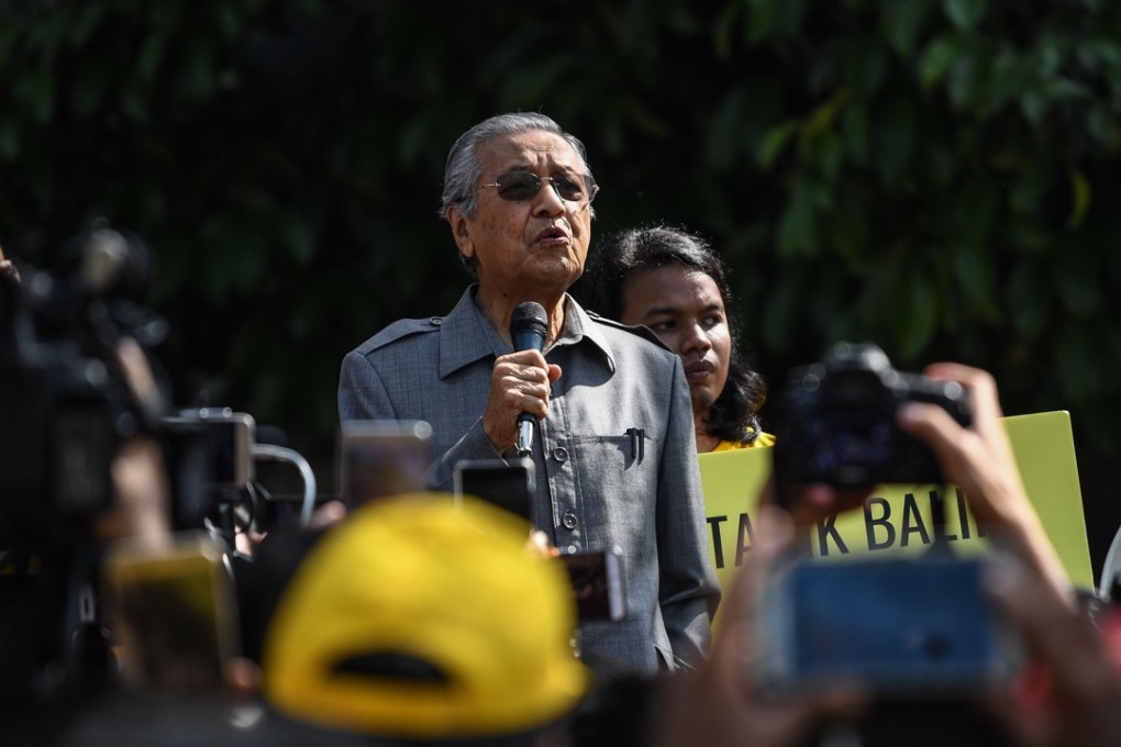 Former Malaysia's prime minister Mahathir Mohamad speaks during a rally organised by Bersih calling to stop a bill to redraw electoral boundaries near the Parliament House in Kuala Lumpur. Photo: AFP