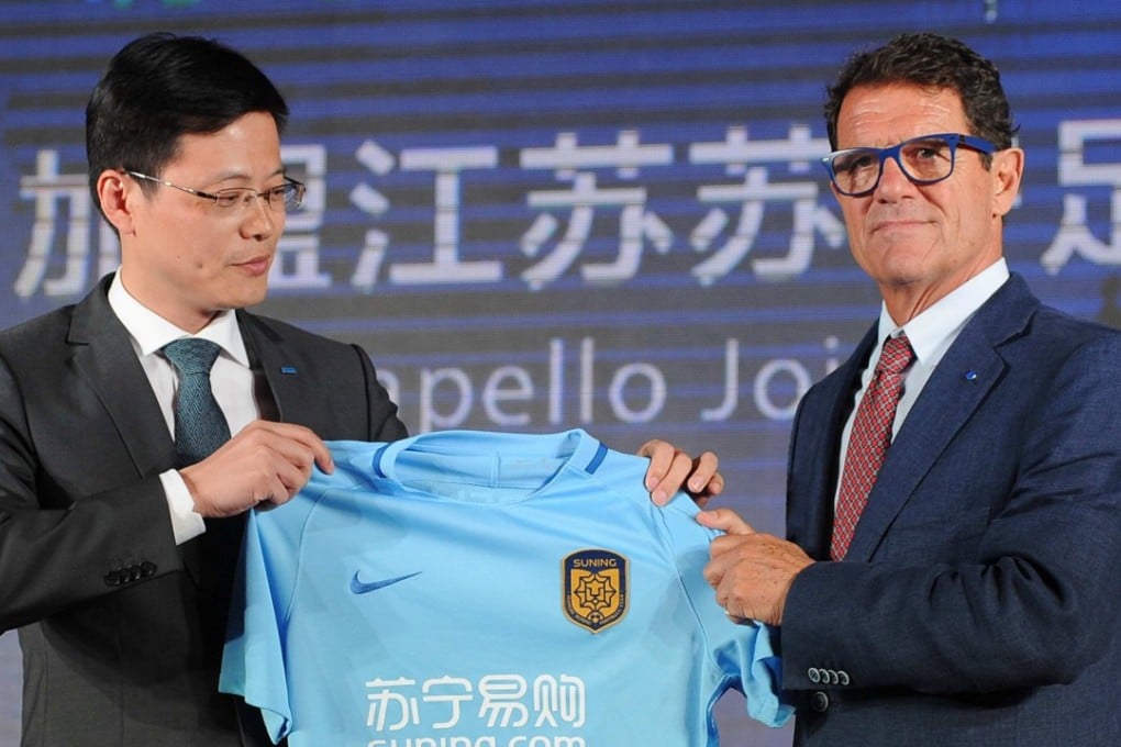 Fabio Capello (right) during his unveiling at Jiangsu Suning in June 2017. Photo: Reuters