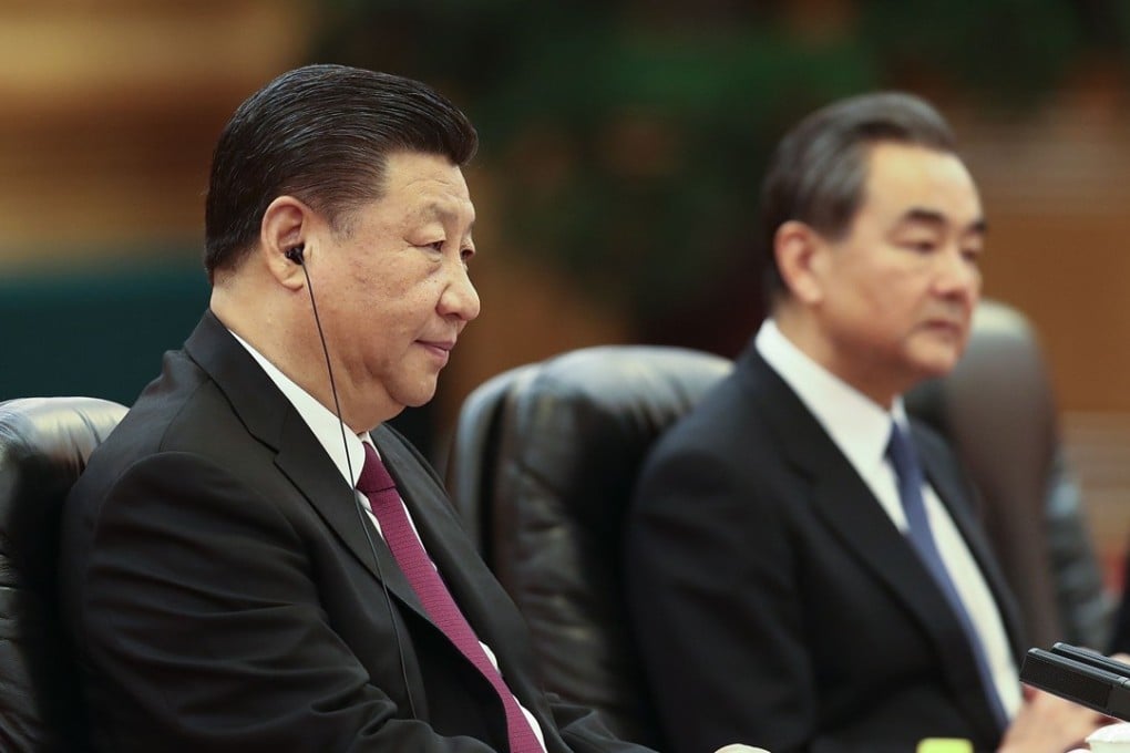 President Xi Jinping and foreign minister Wang Yi listen during a meeting with the president of Cameroon, Paul Biya, in Beijing on March 22. If North Korean leader Kim Jong-un is, as reported, in Beijing for a meeting, it will be his first with Xi despite the long-standing alliance between North Korea and China. Photo: AFP