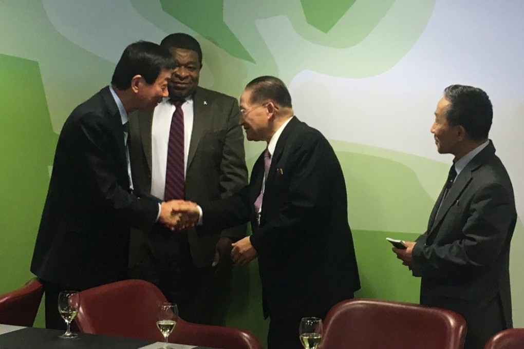 South Korean MP and politician Young Chin (far left) shakes hands with Ri Jong-hyok, director of North Korea's National Reunification Institute and deputy head of its Supreme People's Assembly, during a meeting on the sidelines of the 138th IPU Assembly in Geneva, Switzerland, on Tuesday. Also pictured is Martin Chungong (rear of image), Secretary-General of the Inter-Parliamentary Union (IPU). Photo: Reuters