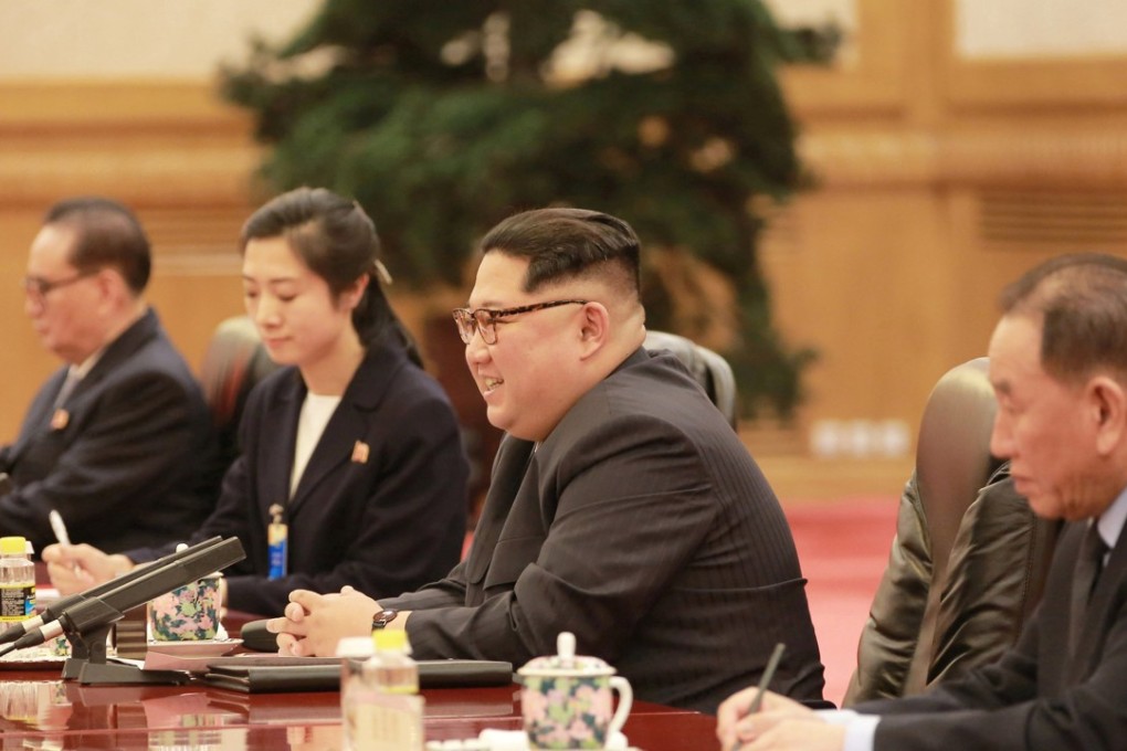 Much to smile about: Kim Jong-un in Beijing. Photo: Reuters