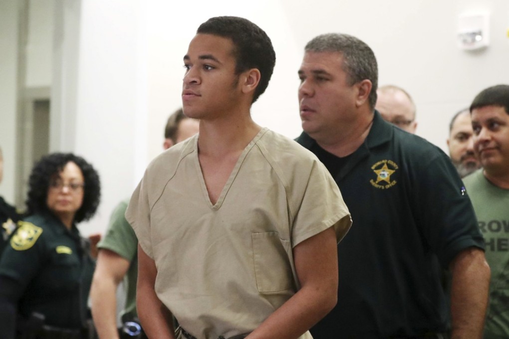 Zachary Cruz, brother of Florida school shooter Nikolas Cruz, walks into court on Thursday in Fort Lauderdale. Zachary Cruz pleaded no contest to trespassing on the campus where his brother allegedly murdered 17 people, and was sentenced to time served and six months of probation. Photo: South Florida Sun-Sentinel via AP