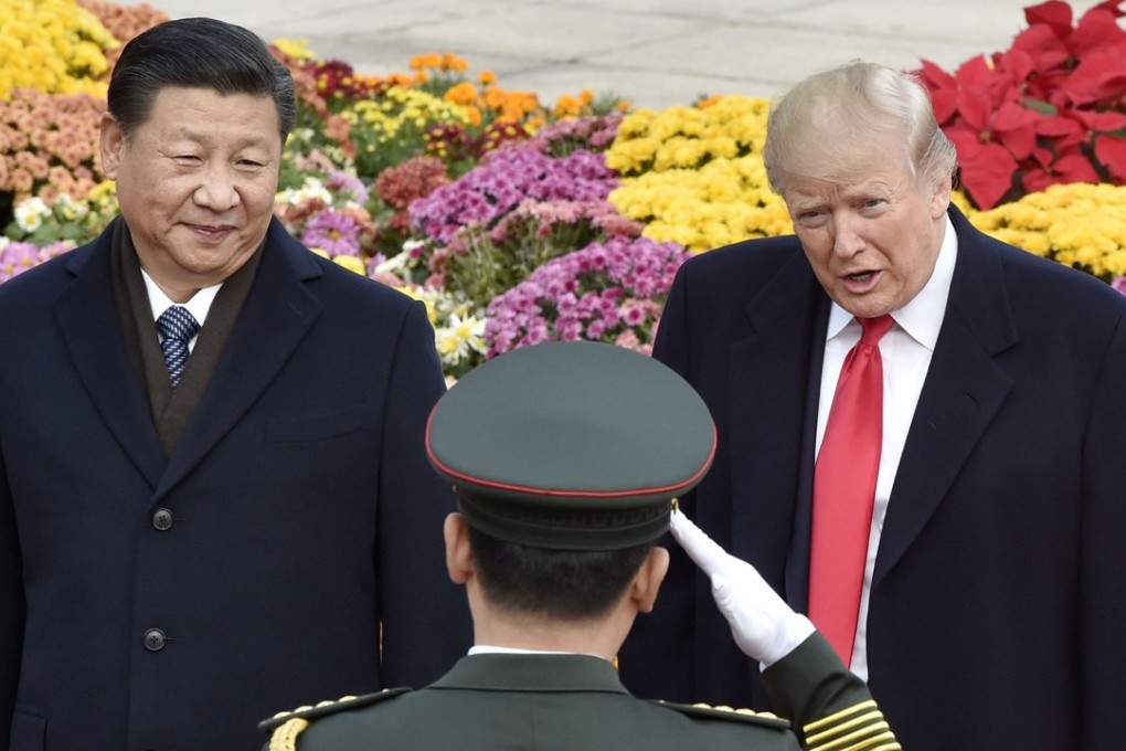 Chinese President Xi Jinping and US President Donald Trump attend a welcome ceremony in Beijing in November 2017. Photo: Kyodo