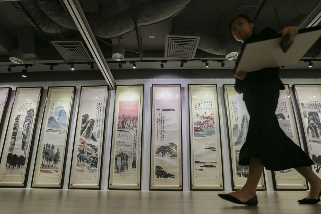Qi Baishi's Twelve Screens of Landscapes was sold to a Chinese buyer at a record US$141 million in 2017. Photo: Felix Wong