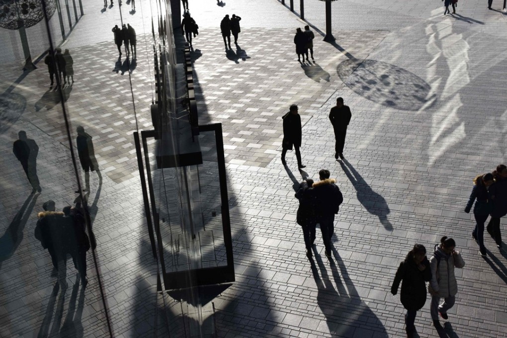 China’s household leverage ratio surged to 49 per cent at the end of last year, from 17.9 per cent at the end of 2008. Photo: AFP