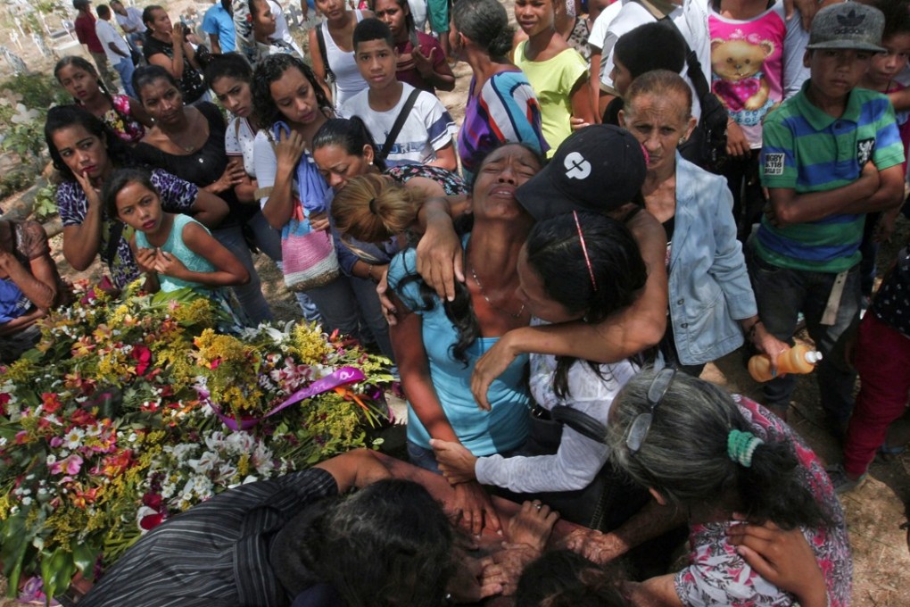 After 68 die in venezula jail fire a new horror many of the bodies