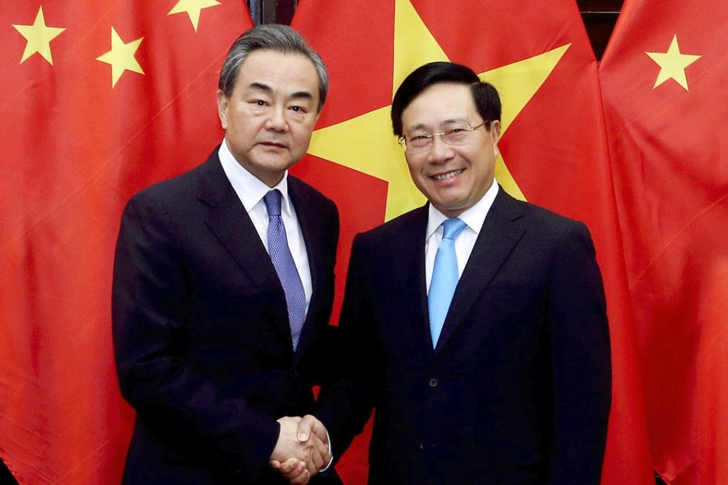 Chinese Foreign Minister Wang Yi (left) and Vietnamese Foreign Minister Pham Binh Minh. Photo: AP
