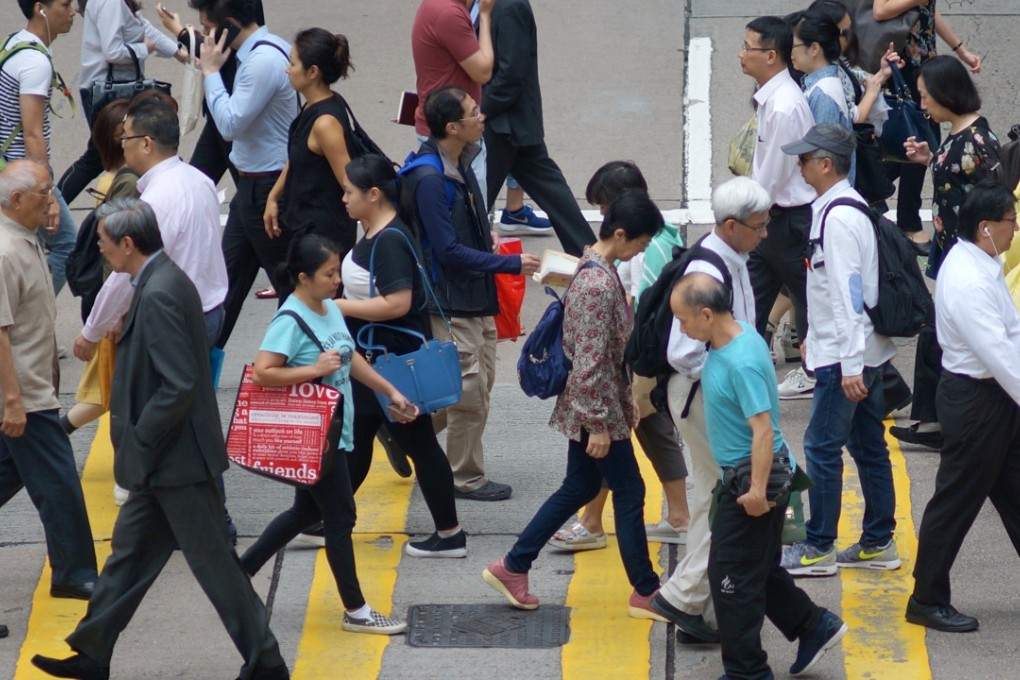 Office workers in Central, the financial district of Hong Kong. Photo: Fung Chang