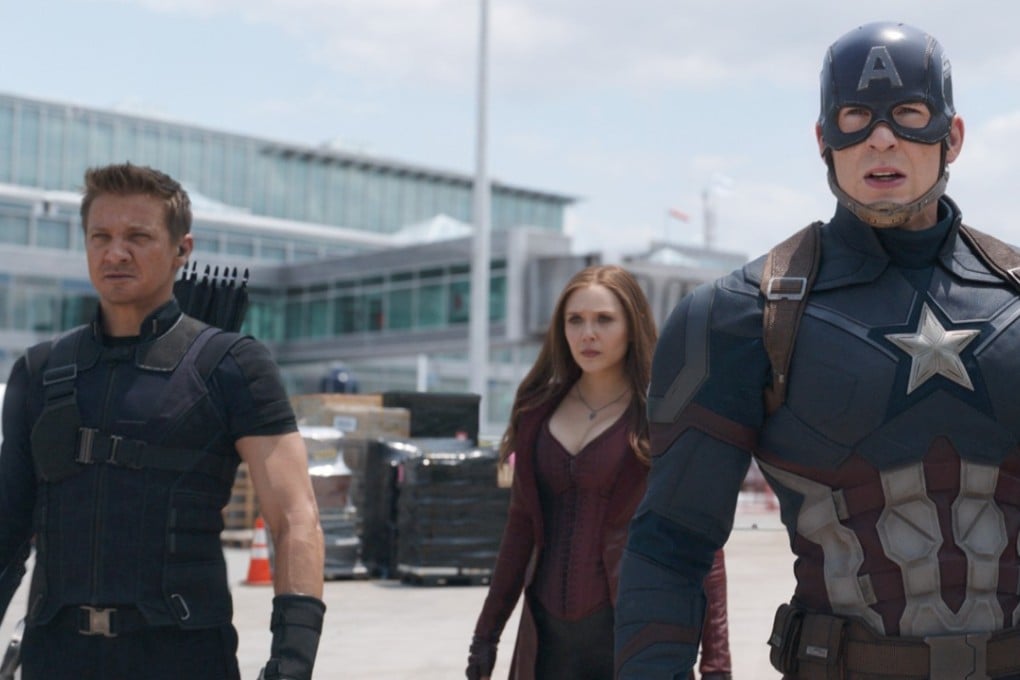 Hawkeye/Clint Barton (left), played by Jeremy Renner, with Scarlet Witch/Wanda Maximoff (Elizabeth Olsen) and Captain America/Steve Rogers (Chris Evans) in a scene from Marvel’s Captain America: Civil War. Photo: Marvel 2016