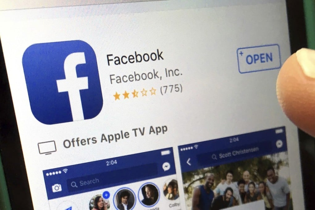 A user gets ready to launch Facebook on an iPhone. Photo: AP/Elise Amendola