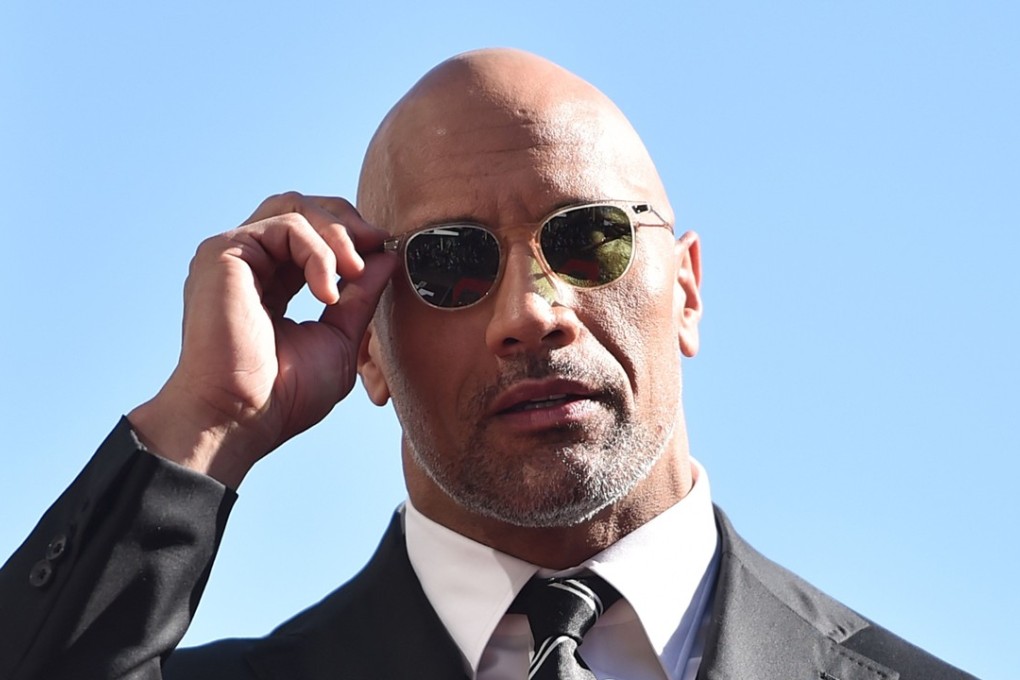Actor Dwayne Johnson (seen in December last year) has opened up about his experiences of depression, which has afflicted both him and his mother. Photo: Getty Images via AFP