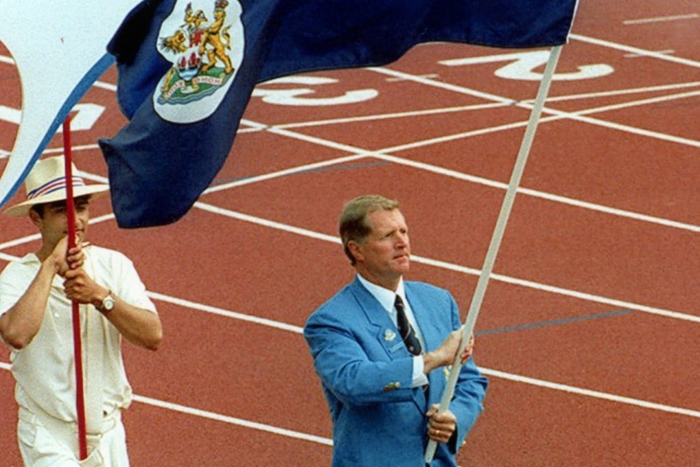 Ken Wallis is Hong Kong’s flag-bearer at the closing ceremony of their last Commonwealth Games in 1994 in Victoria, Canada. Photo: Robert Ng