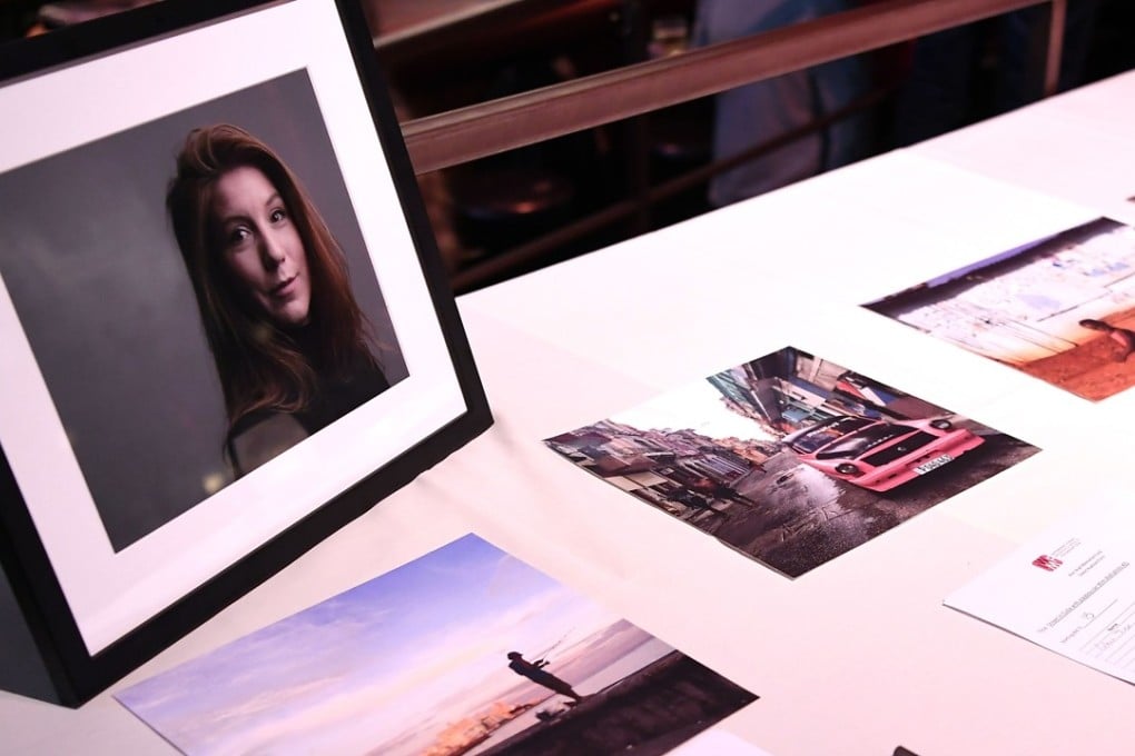 A silent auction with Kim Wall's photographs took place on March 23. The award-winning journalist was killed on assignment interviewing Danish inventor Peter Madsen, who is charged with the murder. Photo: AFP