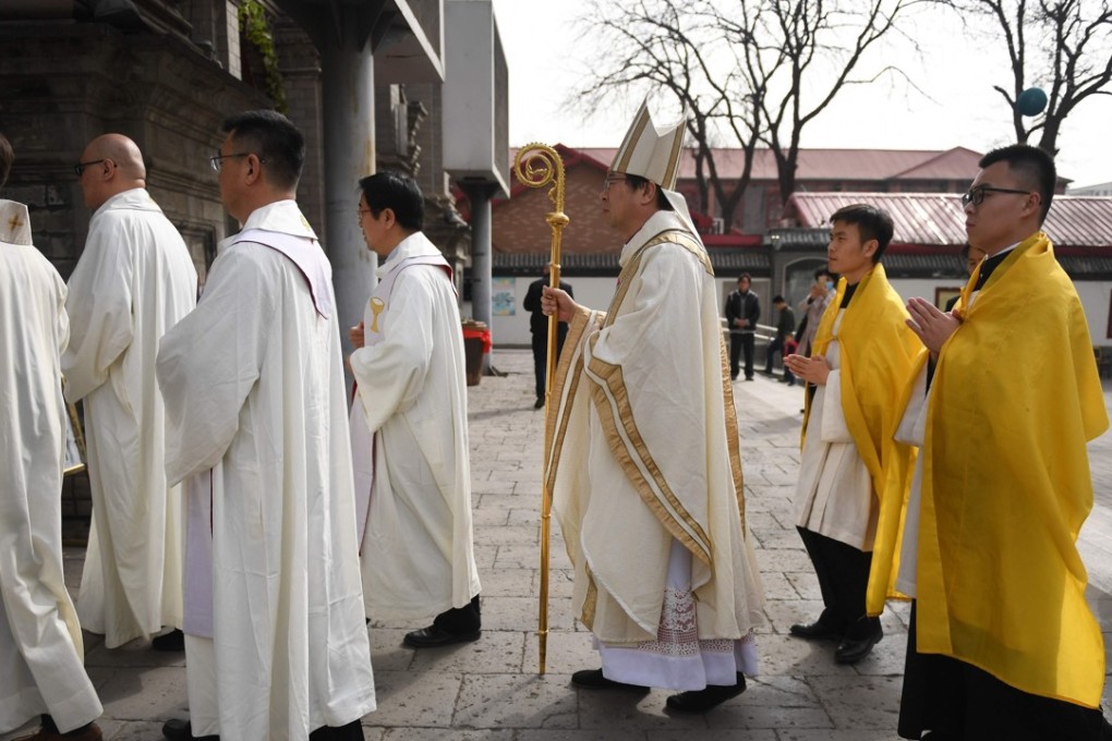 Catholic clergy arrive for mass at Beijing’s state-approved South Cathedral. Photo: AFP