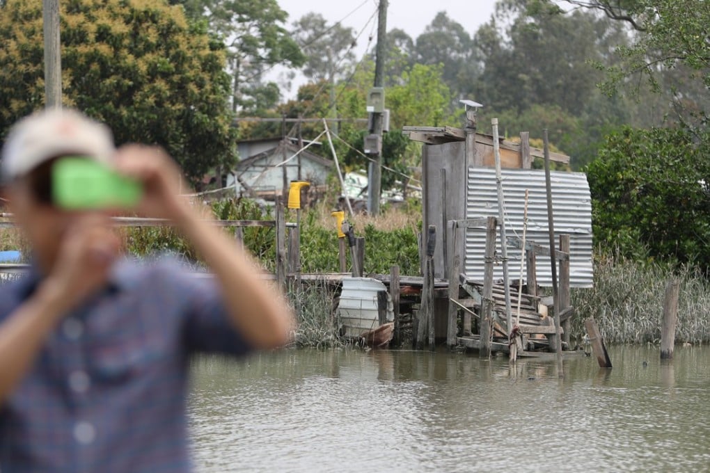 The wooden pier was damaged by the flames. Photo: Winson Wong