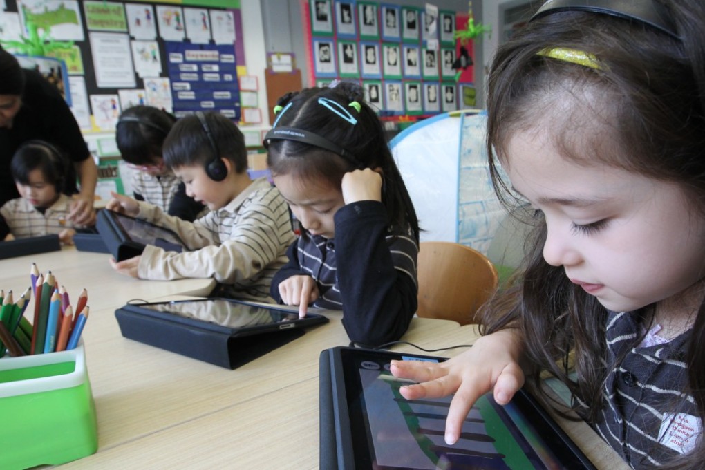 Students of Renaissance College using the i-Pad in class.