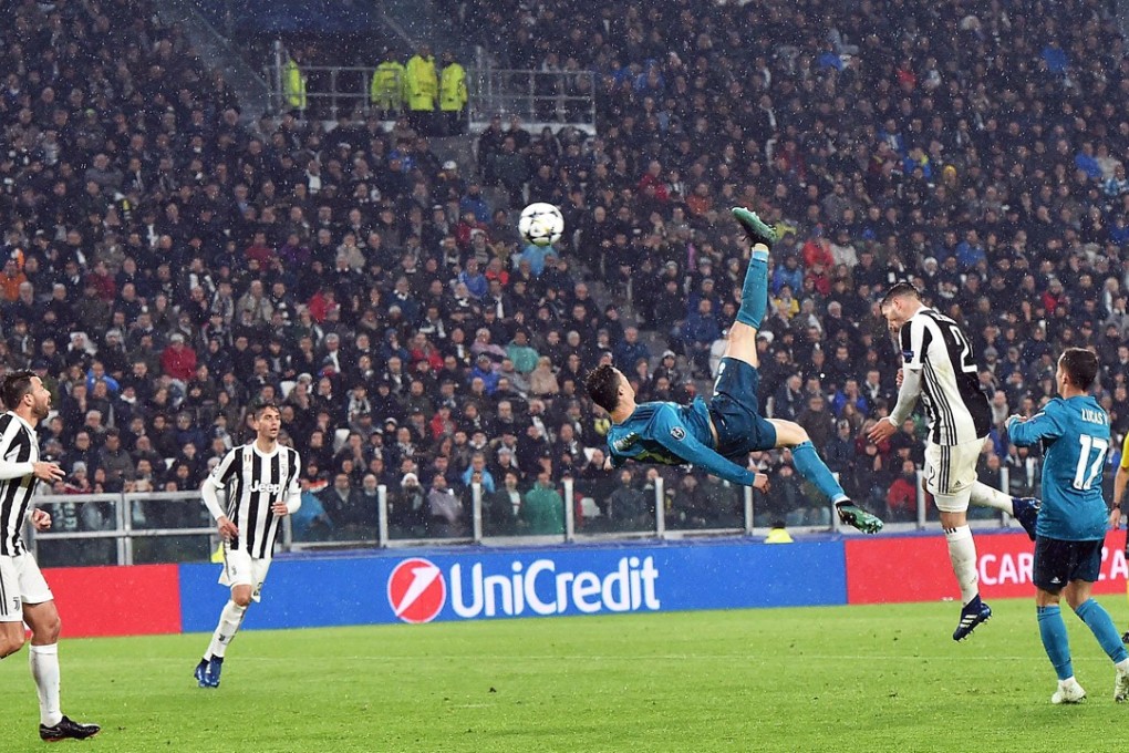Real Madrid's Cristiano Ronaldo scores his side’s second goal during the UEFA Champions League quarter final first leg soccer match against Juventus. Photo: EPA