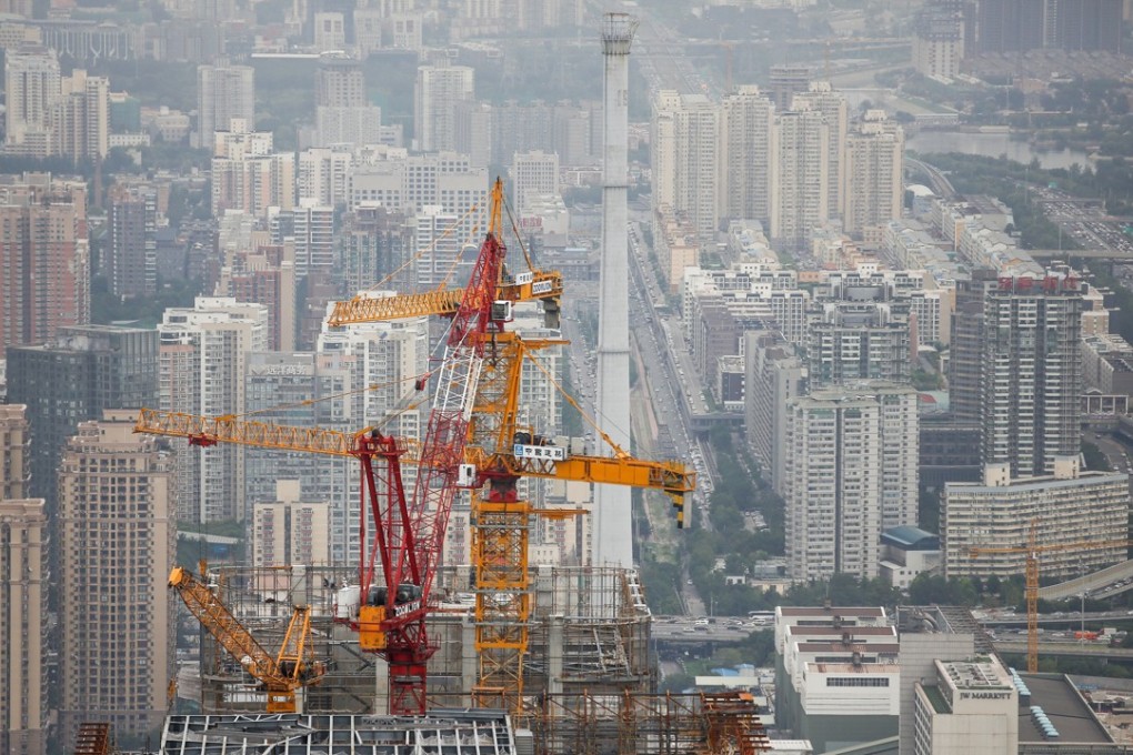 A file picture of construction work on a skyscraper in Beijing last year. Photo: Beijing