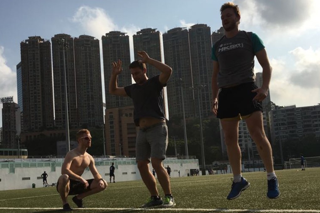 The Post team practising their burpee technique. Photos: Handout
