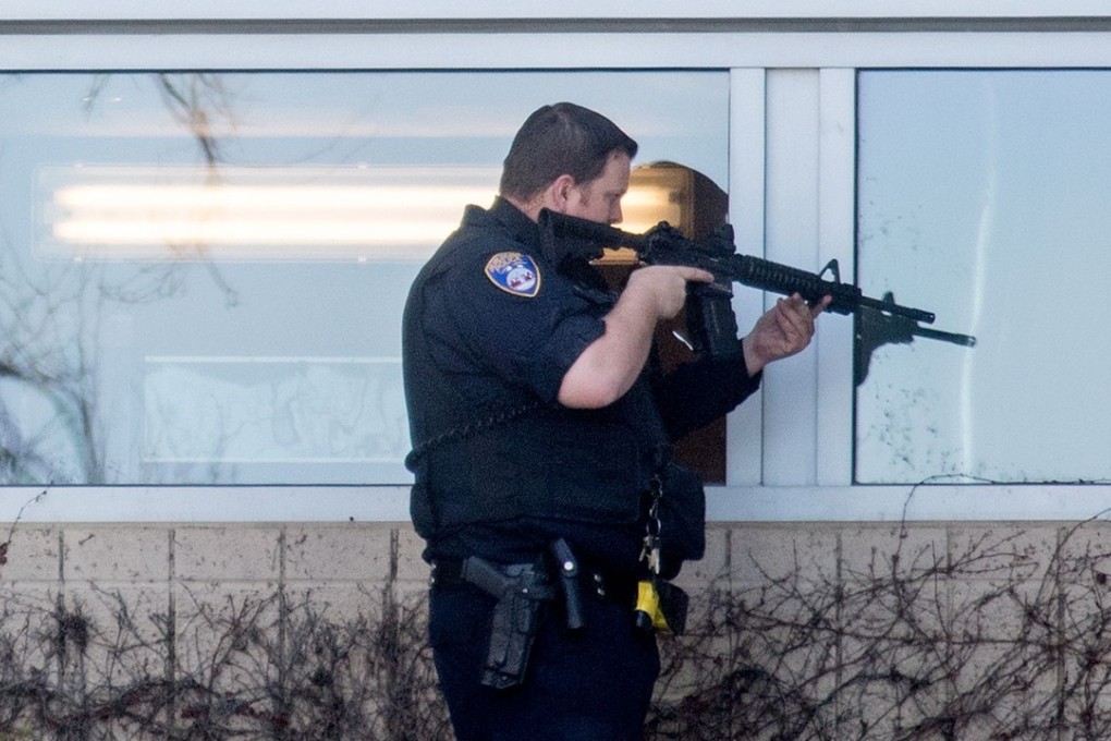 A police officer sweeps a building at YouTube's corporate headquarters. Photo: AFP