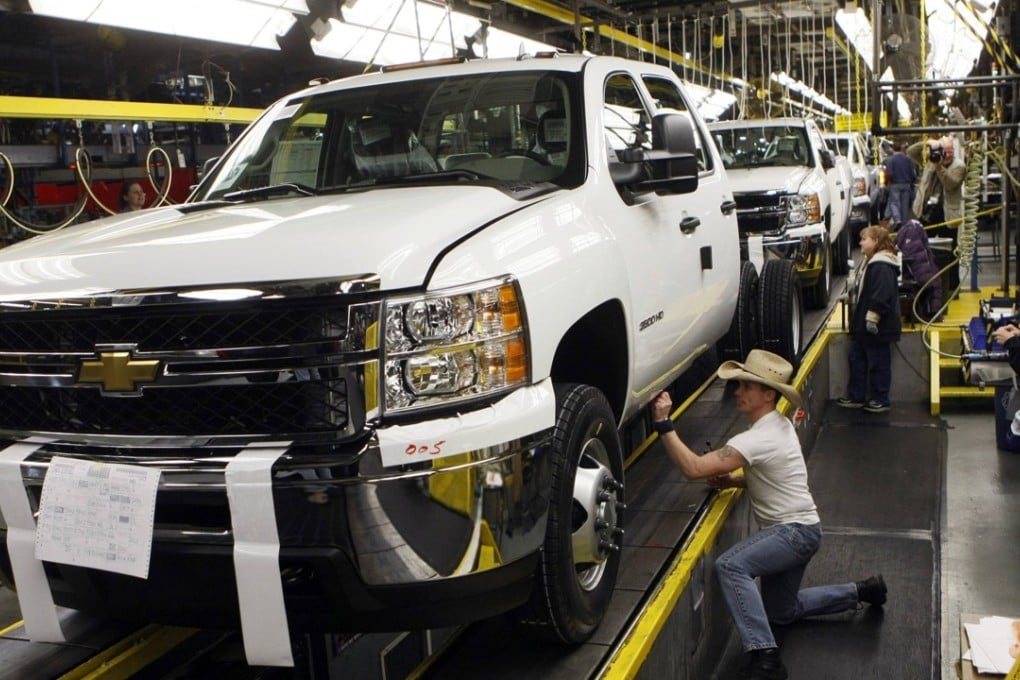 General Motors employees work on a Chevrolet Silverado pickup truck at the company’s plant in Flint, Michigan. US carmakers could be among the companies worst hit by China’s new tariff plans. Photo: Reuters